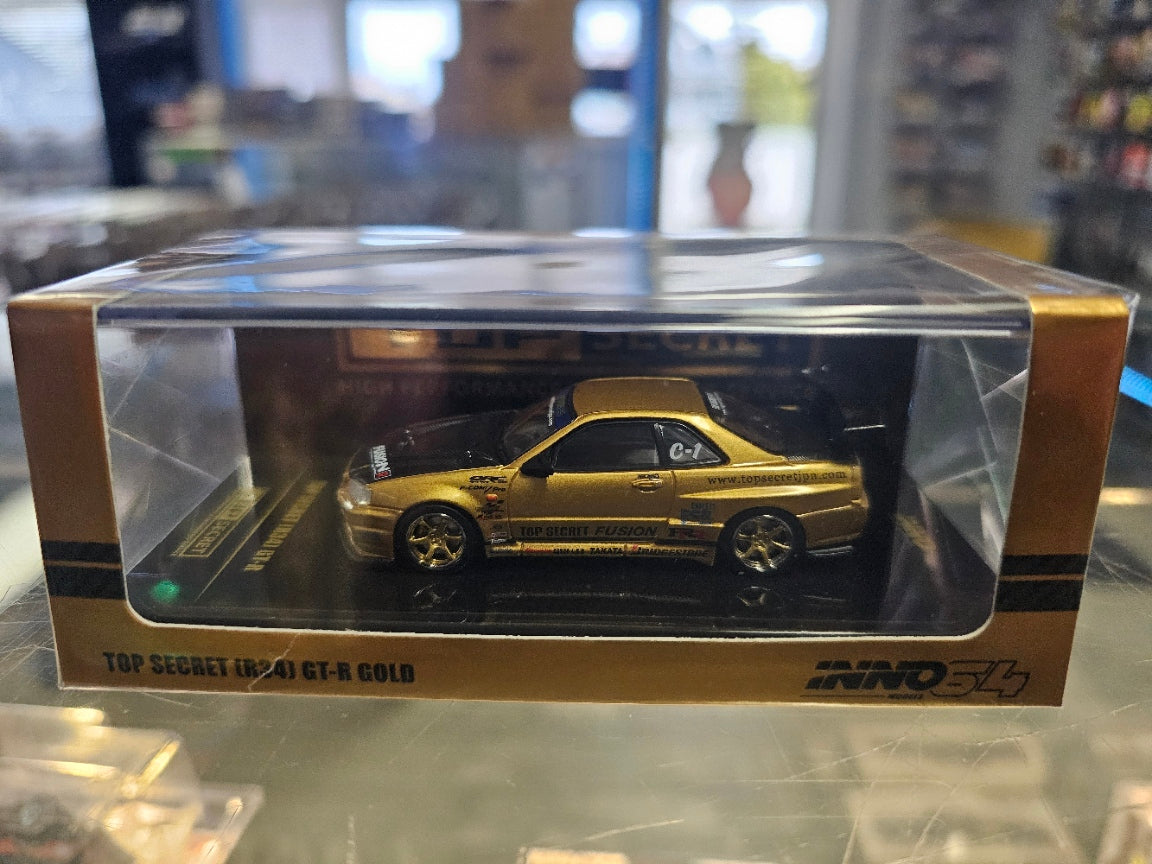 Top Secret Nissan Skyline GT-R R34 Gold Inno64 1/64 scale