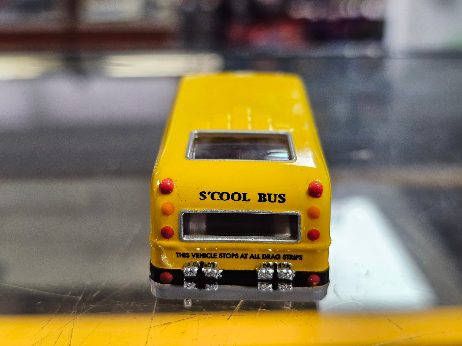 Auto World HO 4-Gear Yellow S'Cool Bus Slot Car