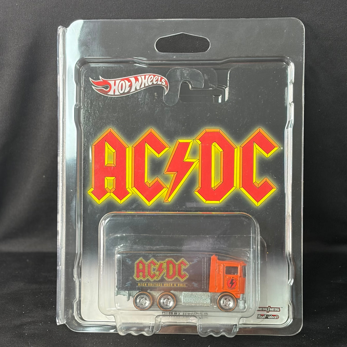 Hot Wheels Pop Culture AC/DC Hiway Hauler – Orange