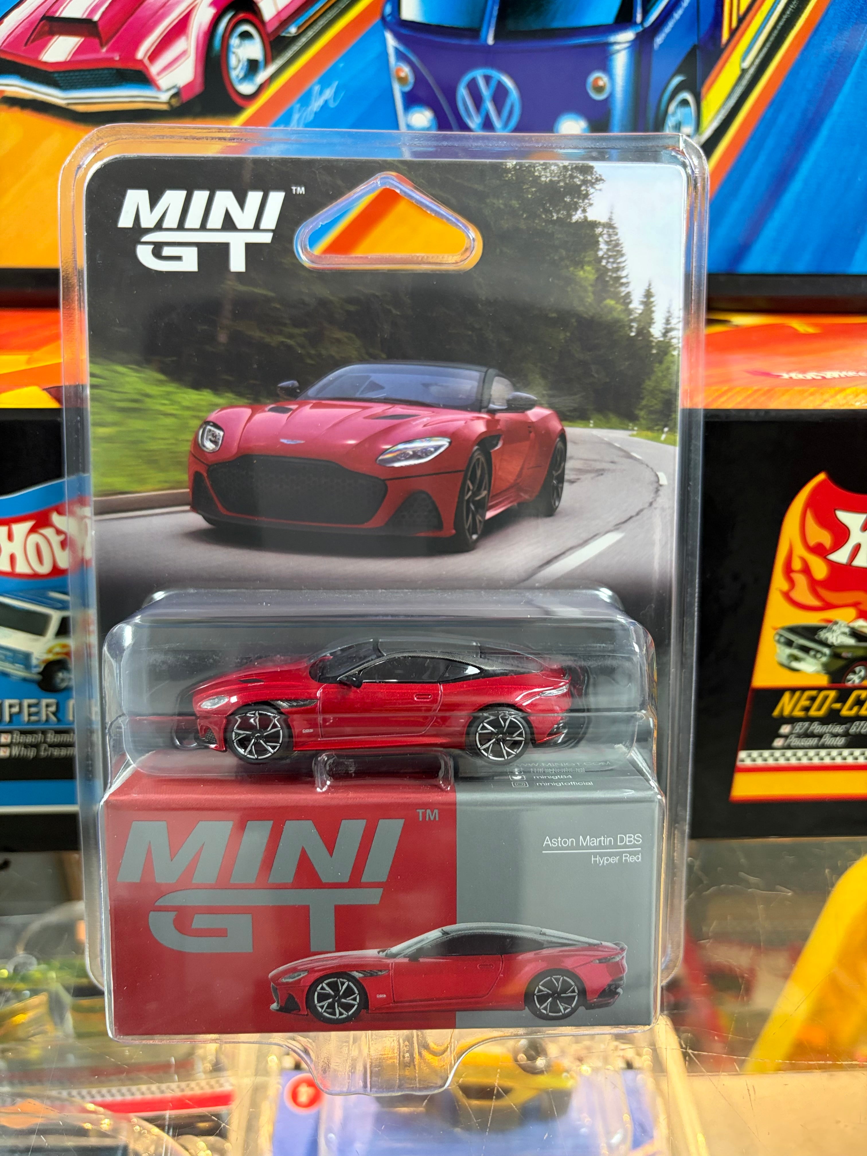 Mini GT #1065 Aston Martin DBS – Hyper Red