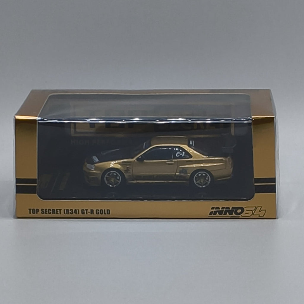 INNO64 Nissan Skyline GT-R R34 RHD Top Secret Gold